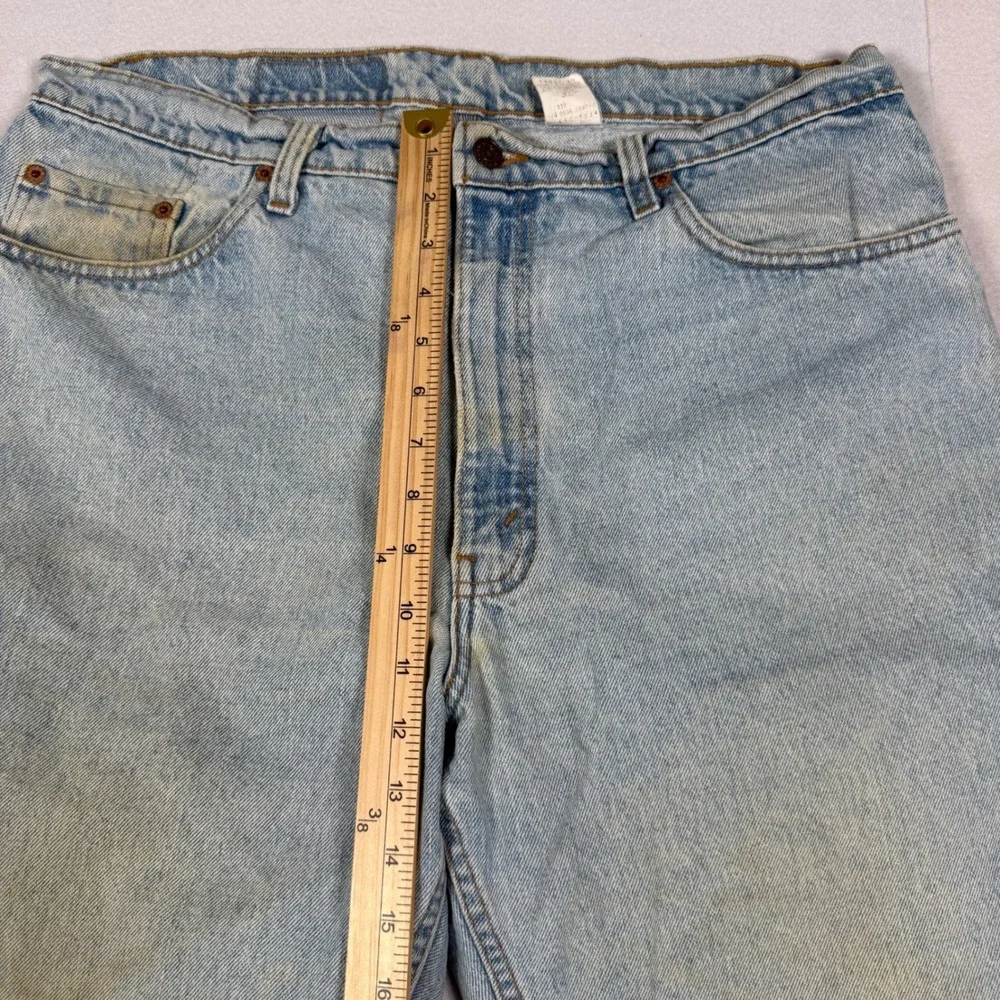 Vintage 90s Levis 550 Relaxed Fit Tapered Jeans Light Wash 38x28 Made in USA